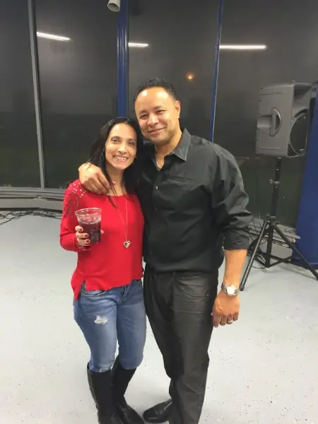 Dan and Yajaira Maya, the owners of Auto Perfection, at a community event