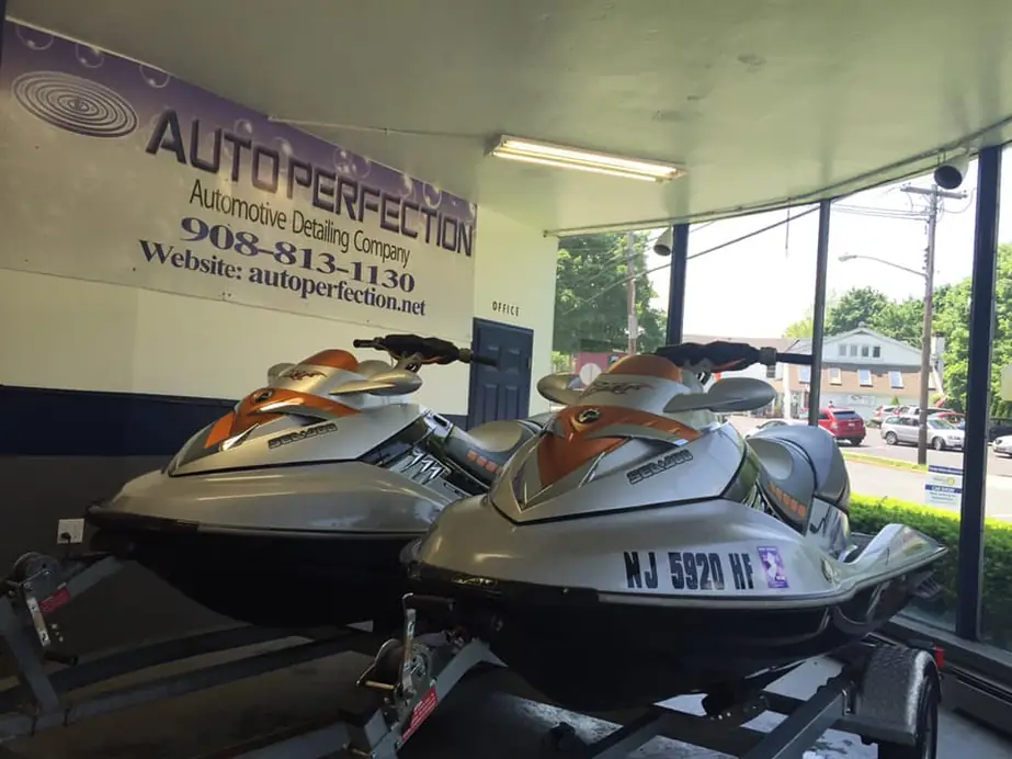 Two jet skis lined up in the shop window